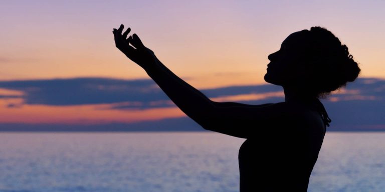 woman praying outdoors